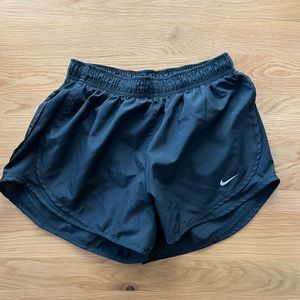 Black Nike running shorts